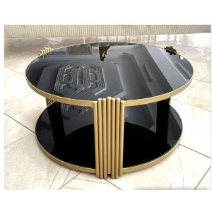 Table basse design moderne modèle Marcel couleur noir avec une touche doré